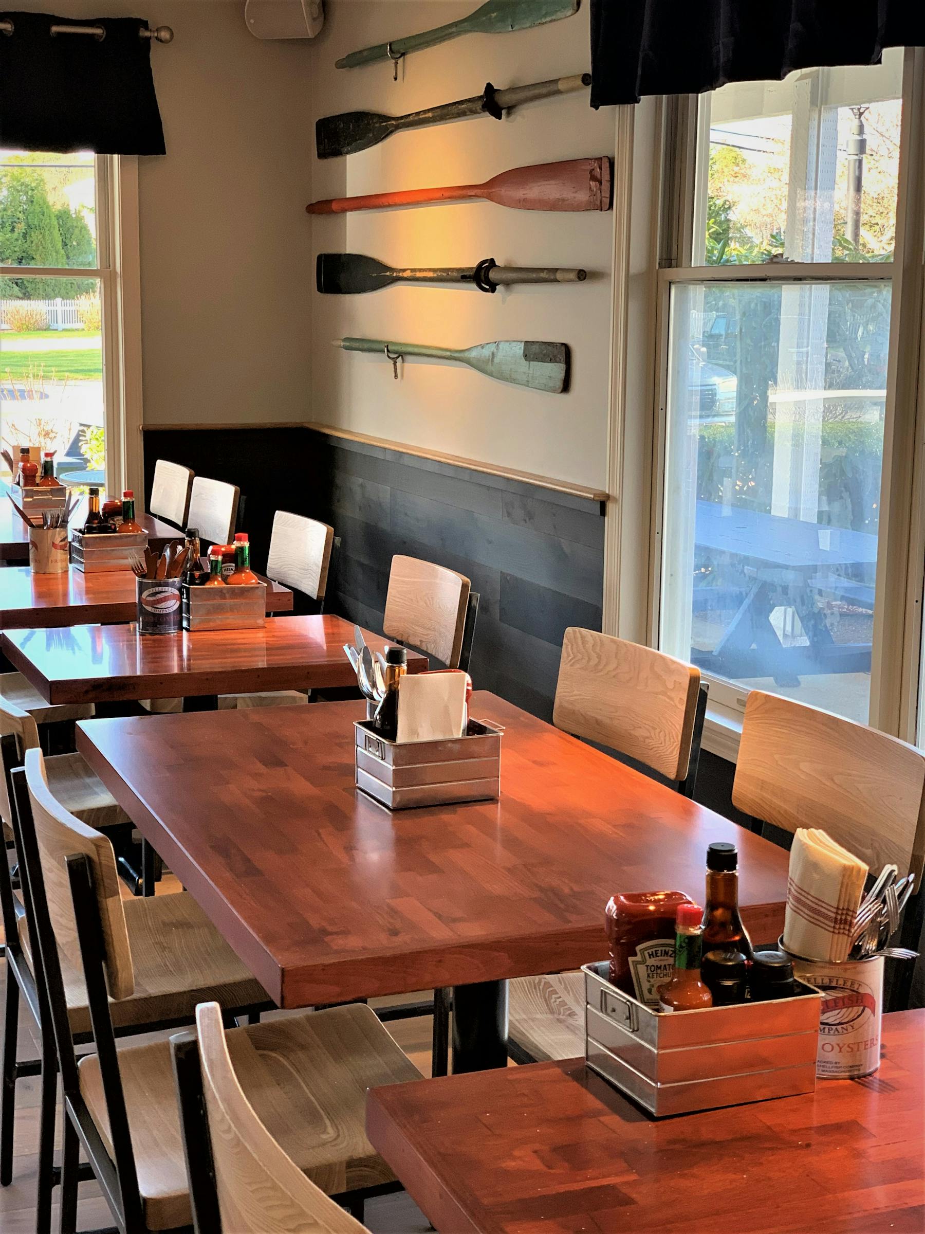 a dining room table in front of a window